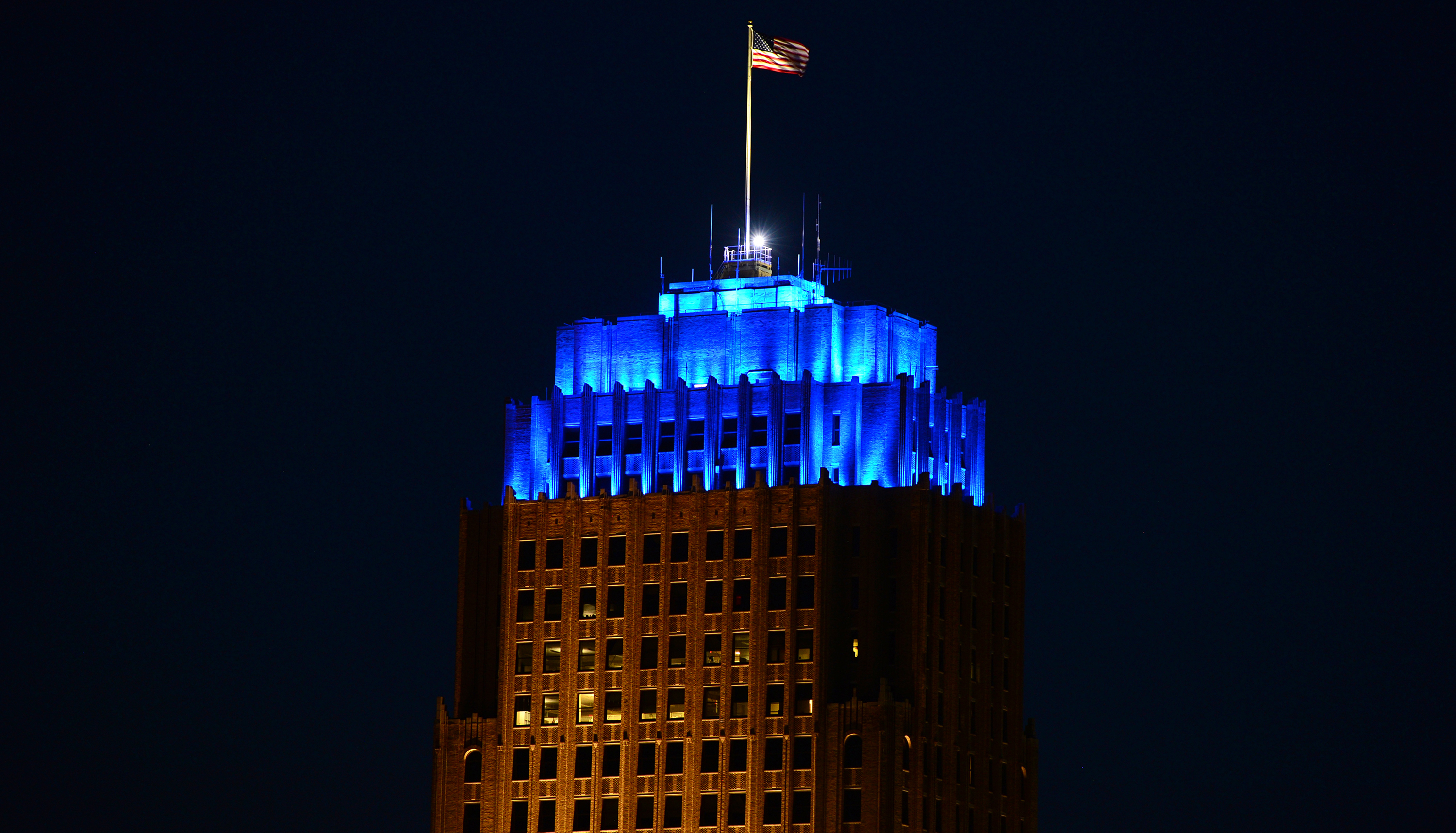 The iconic PPL Tower lit up at night in downtown Allentown, Pennsylvania